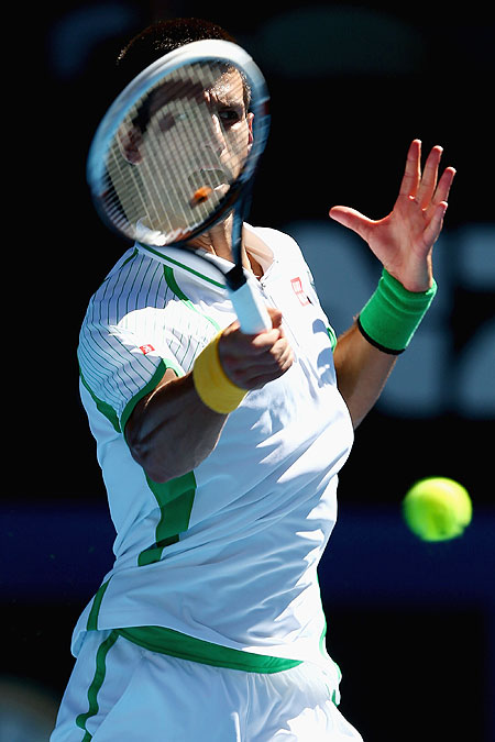 Serbia's Novak Djokovic in action against Paul-Henri Mathieu of France