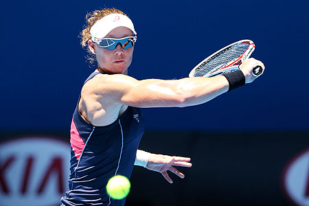 Samantha Stosur of Australia plays a backhand against Kai-Chen Chang of Chinese Taipei