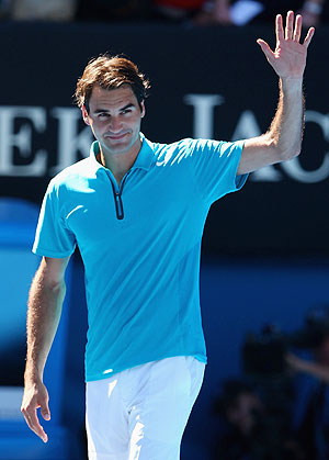 Roger Federer celbrates after winning his first round match on Tuesday