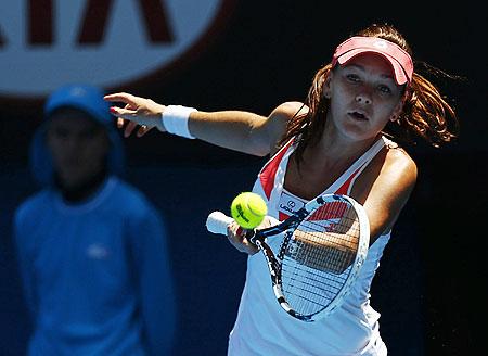 Agnieszka Radwanska of Poland hits a return to Irina-Camelia Begu of Romania