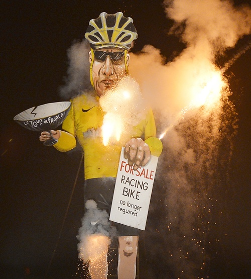 An effigy of US cyclist Lance Armstrong burns