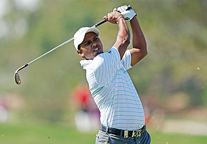 SSP Chowrasia of India watches a shot on the 18th hole during the third round of the Abu Dhabi HSBC Golf Championship at Abu Dhabi Golf Club on Saturday