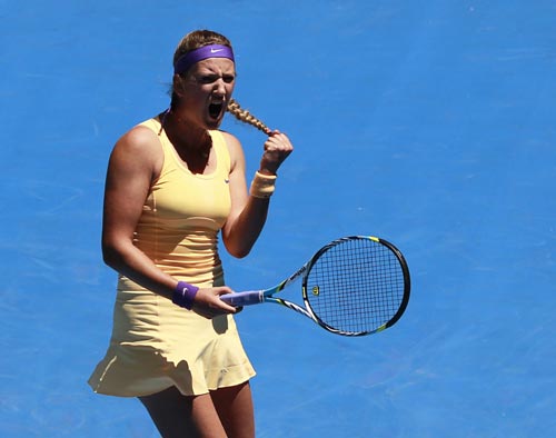 Victoria Azarenka of Belarus celebrates defeating Svetlana Kuznetsova of Russia in their women's singles quarter-final match