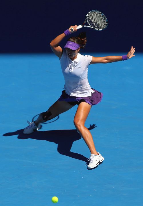 Na Li of China plays a forehand in her Semifinal match against Maria Sharapova of Russia during day eleven of the 2013 Australian Open