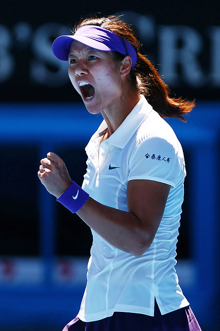 Na Li celebrates a point during her semi-final against Maria Sharapova on Thursday