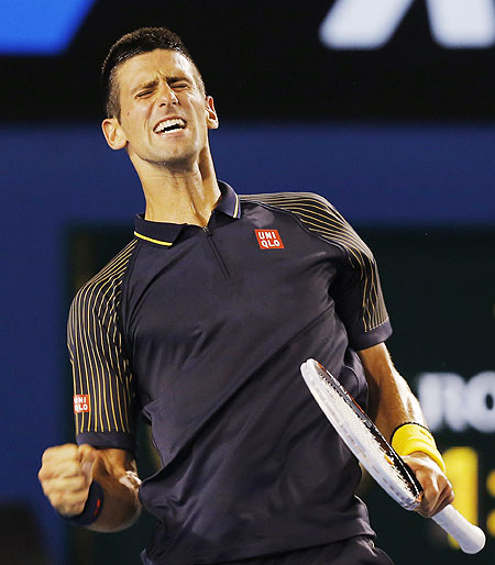 Novak Djokovic of Serbia celebrates defeating David Ferrer of Spain during the men's singles semi-final on Thursday