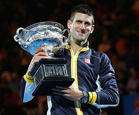 Novak Djokovic holds the Norman Brookes Challenge Cup after the Australian Open final against Andy Murray on Sunday