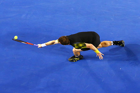 Andy Murray plays a backhand during the final against Novak Djokovic