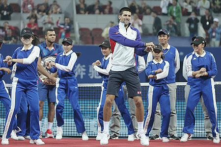 Novak Djokovic dances to the 'Gangnam Style' after defeating Jo-Wilfried Tsonga during the final of the China Open in October