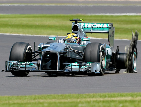 Lewis Hamilton has a left rear tyre failure during the British Formula One Grand Prix