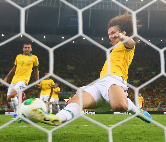 David Luiz of Brazil makes a goal line clearance