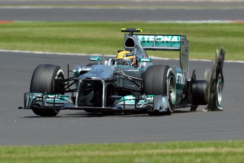 Lewis Hamilton has a left rear tyre failure