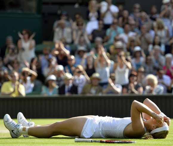 PHOTOS: Force Lisicki too strong for wily Radwanska in Wimbledon semis ...
