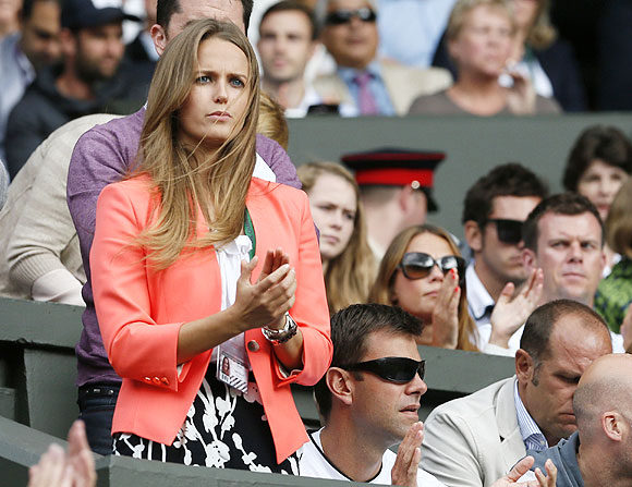 Kim Sears, the girlfriend of Andy Murray of Britain, celebrates as Andy Murray beat Fernando Verdasco in the quarters at the Wimbledon Tennis Championships, in London on Wednesday