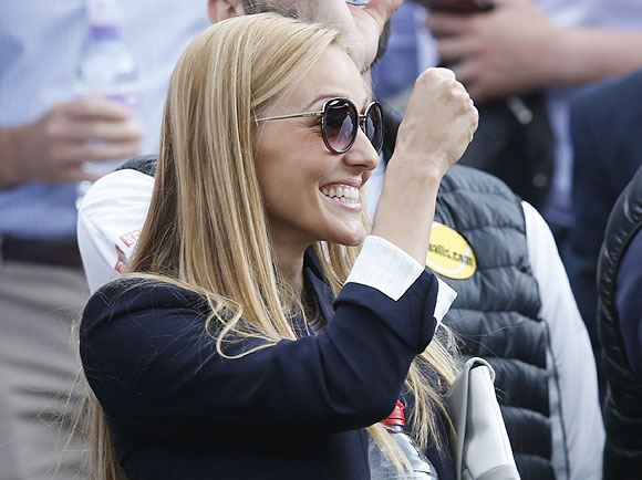 Jelena Ristic, the girlfriend of Novak Djokovic, is ecstatic after Djokovic defeated Tomas Berdych  in their men's quarter-final tennis match at the Wimbledon Tennis Championships, on Wednesday