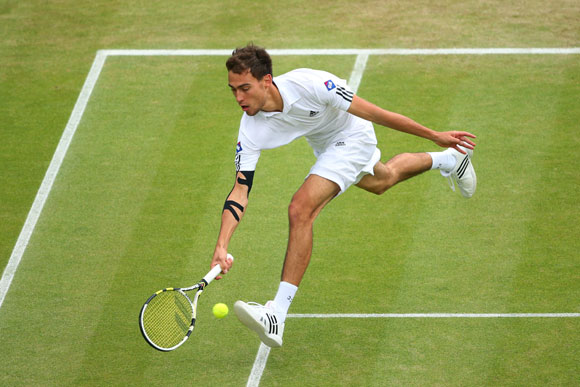 Jerzy Janowicz of Poland plays a forehand during his quarter-final against compatriot Lukasz Kubot