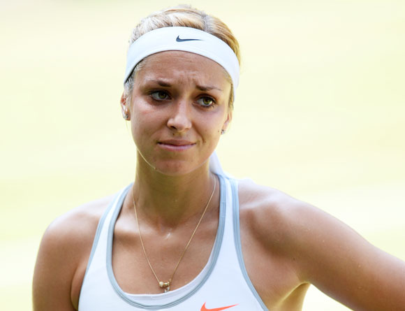 Sabine Lisicki of Germany reacts during the Ladies' Singles final against Marion Bartoli of France