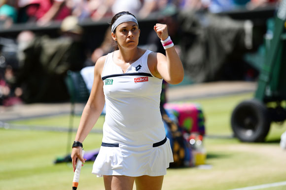 Marion Bartoli celebrates a point in the final