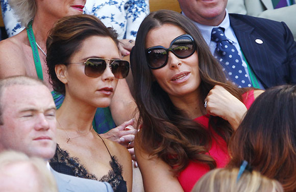 Victoria Beckham and Tana Ramsey, the wife of celebrity chef Gordan Ramsey, at the Wimbledon men's final on Sunday