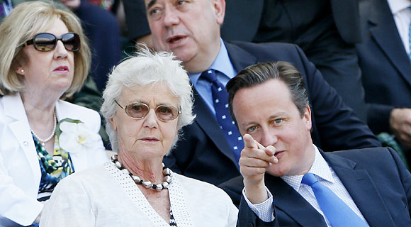 Britain's Prime Minister, David Cameron (right) sits with his mother Mary on Centre Court during the Wimbledon final on Sunday