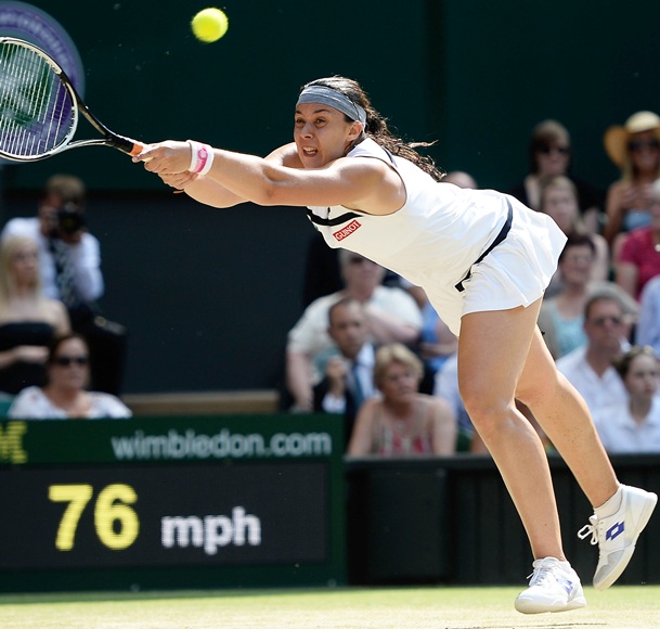 Marion Bartoli of France plays a forehand