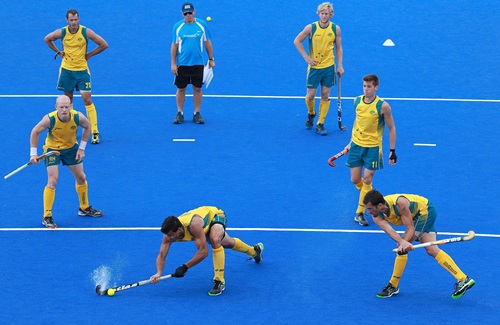 Ric Charlesworth watches his Australian players execute a penalty-corner drill