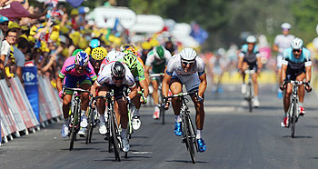 Mark Cavendish (left) of Great Britain and Omega Pharma- Quick Step sprints against stage winner Marcel Kittel (right) of Germany and Team Argos-Shimano during stage twelve of the 2013 Tour de France, on Thursday