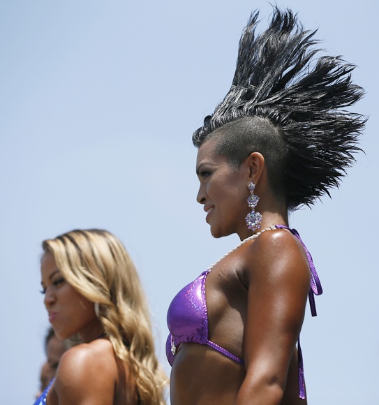 Women compete in the Muscle Beach Independence Day bodybuilding contest