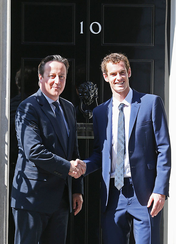 Andy Murray is greeted by British Prime Minister David Cameron