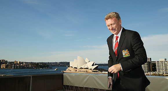 David Moyes smiles after taking a photo of Sydney Harbour