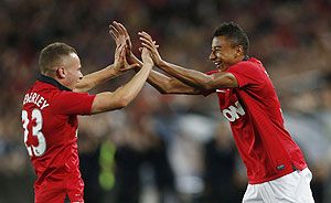 Manchester United's Jesse Lingard (right) celebrates with teammate Tom Cleverley after scoring against A-League All Star XI during their friendly match in Sydney on Saturday