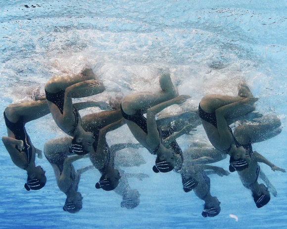 Spain's team are seen underwater as they perform in the synchronised swimming free combination routine