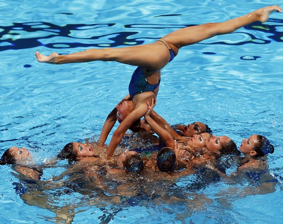 Greece's team perform in the synchronised swimming