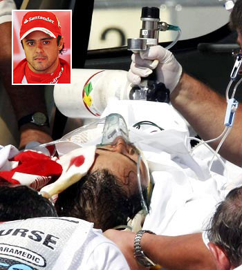 An injured Felipe Massa being taken to a hospital after crashing
