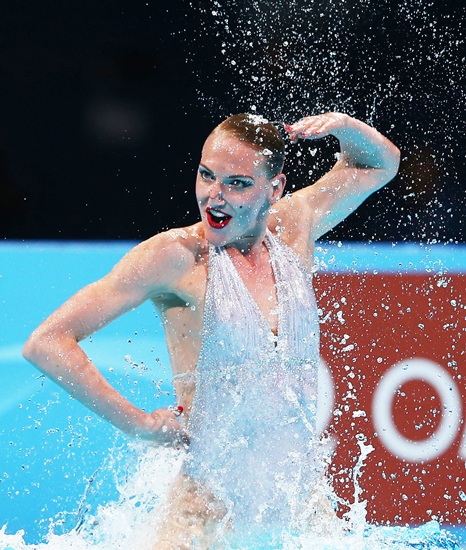 Svetlana Romashina of Russia competes in the Synchronized Swimming Solo Free final