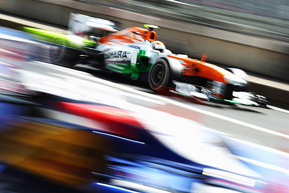 Adrian Sutil of Germany and Force India drives