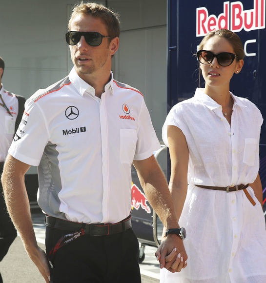McLaren Formula One driver Jenson Button of Britain and his girlfriend, Japanese-Argentine model Jessica Michibata