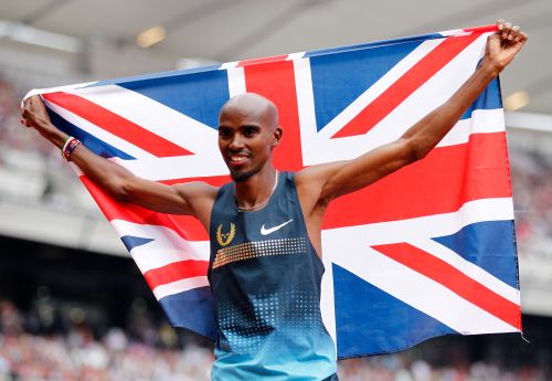 Mo Farah of Great Britain celebrates after winning the Men's 3000m during day two of the Sainsbury's Anniversary Games - IAAF Diamond League 2013 at The Queen Elizabeth Olympic Park