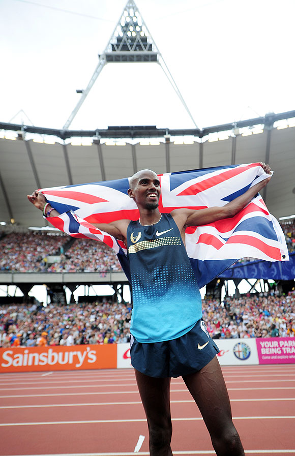 Mo Farah of Great Britain celebrates after winning the Men's 3000m during day two of the Sainsbury's Anniversary Games - IAAF Diamond League 2013 at The Queen Elizabeth Olympic Park in London on Saturday