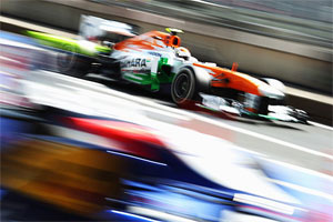 Adrian Sutil of Force India races during the Indian F1 GP in 2012