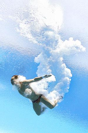 Qiu Bo of China competes in the Men's 10m Platform Diving