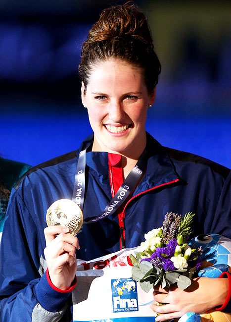 Missy Franklin shows the gold medal after her victory in the women's 100m backstroke final