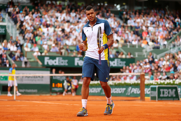 Jo-Wilfried Tsonga of France celebrates a point during his match against Viktor Troicki of Serbia