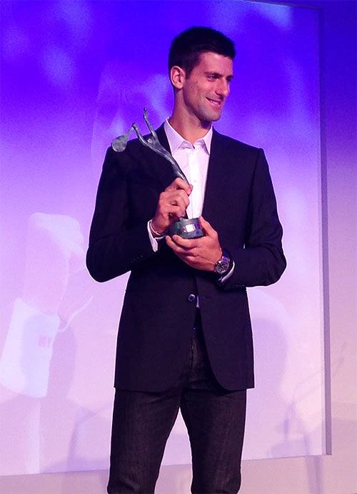 Novak Djokovic with his trophy at the ITF annual Champions Dinner on Tuesday