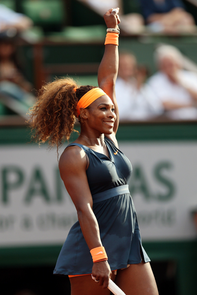 Serena Williams of United States of America celebrates match point in her match against Sara Errani of Italy