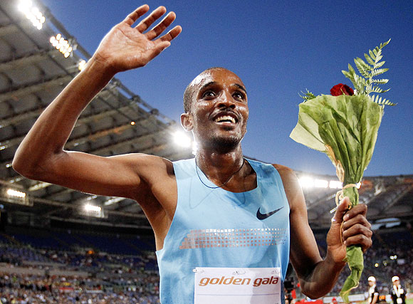 Yenew Alamirew of Ethiopia celebrates after winning the men's 1500m event during the Golden Gala IAAF Diamond League at the Olympic stadium in Rome on Thursday