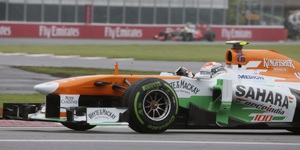 Force India celebrates 100th GP with double-score