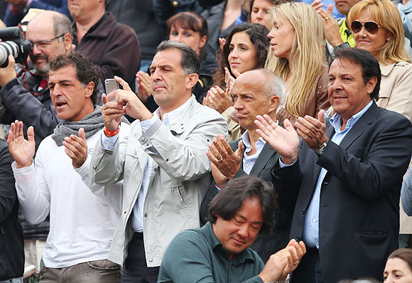 Rafael Nadal's uncle Miguel Nadal (left), father Sebastian Nadal (right), girlfriend Xisca Perello (centre top), sister Isabel Nadal (2nd form right top) and mother Ana Maria Parera (right top) during the French Open men's final on Sunday