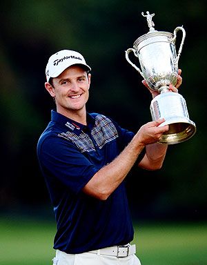 Justin Rose of England celebrates with the U.S. Open trophy after winning the 113th U.S. Open at Merion Golf Club in Ardmore, Pennsylvania, on Sunday