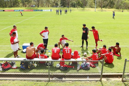 Tahiti players listen to assistant coach Ludovic Graugnard